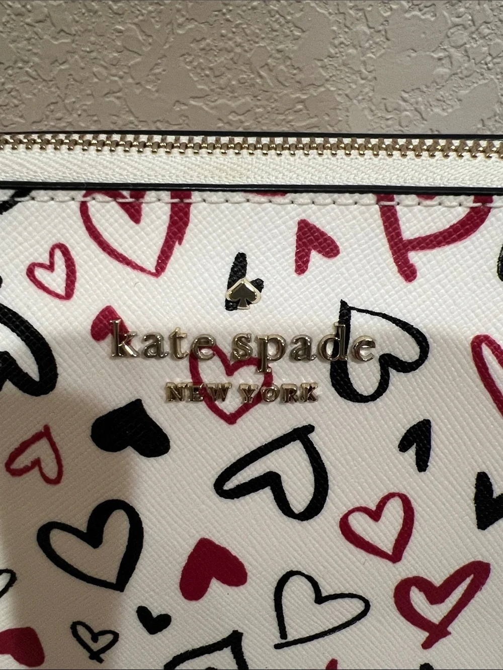 kate spade White Cosmetic Pouch with Red & Black Heart Print